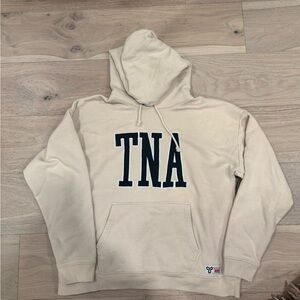 TNA Beige Hoodie with Black Logo